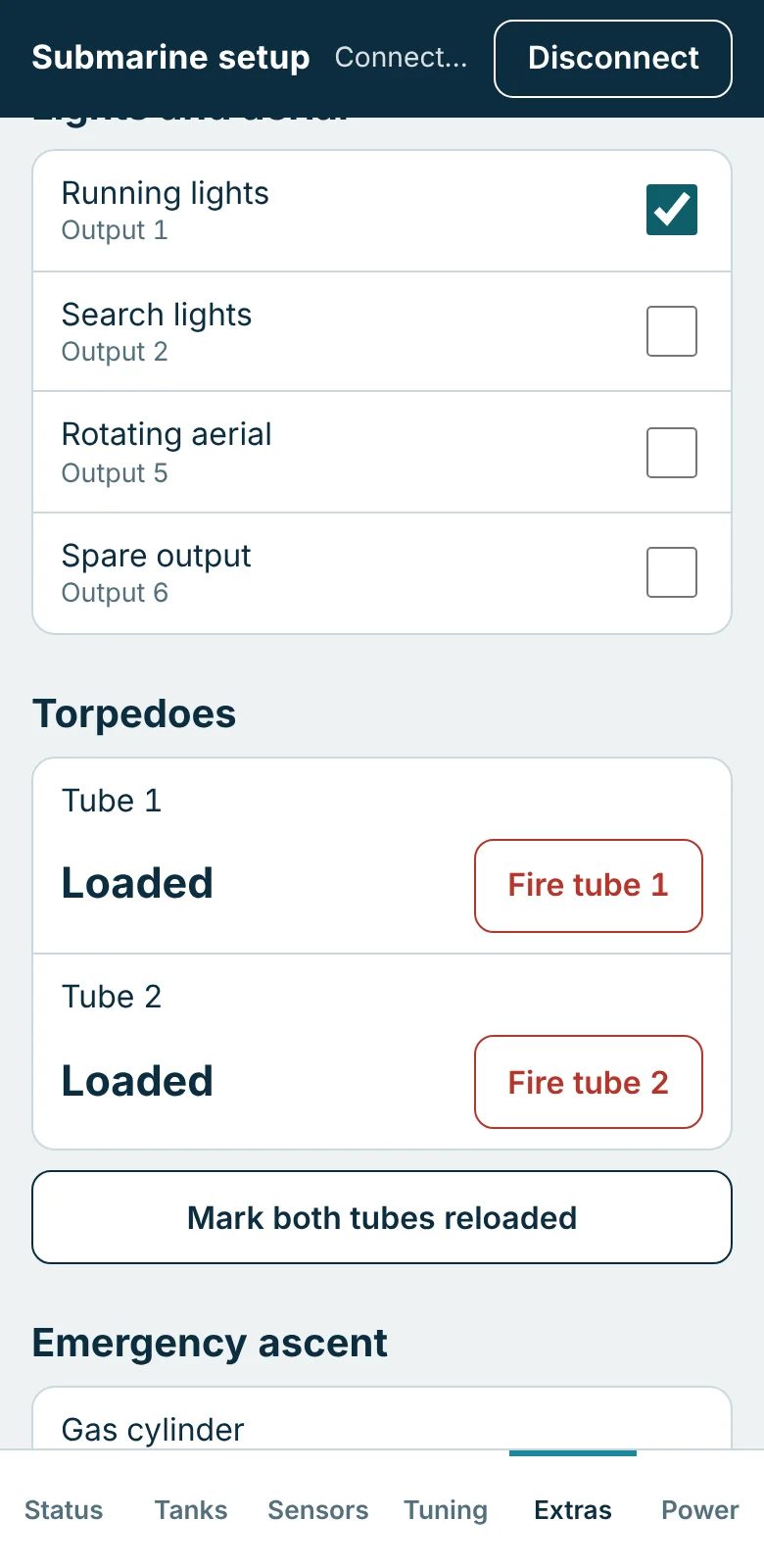 Extras tab with switches for running lights, search lights, rotating aerial and spare output, and Fire buttons for two loaded torpedo tubes.